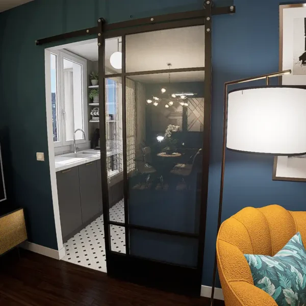 La porte coulissante du nouvel accès à la cuisine. Pratique, elle n'empiète pas sur les deux espaces.